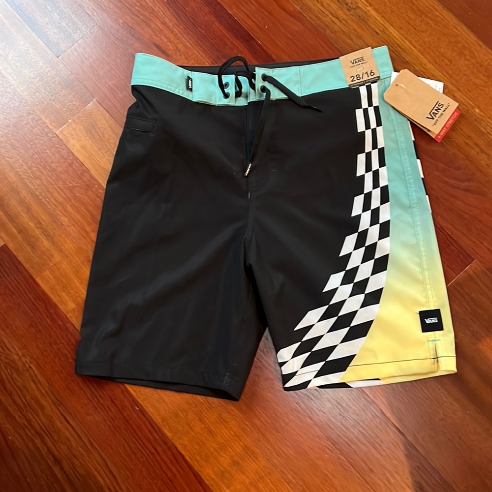 Vans boys board shorts.  New with tags.